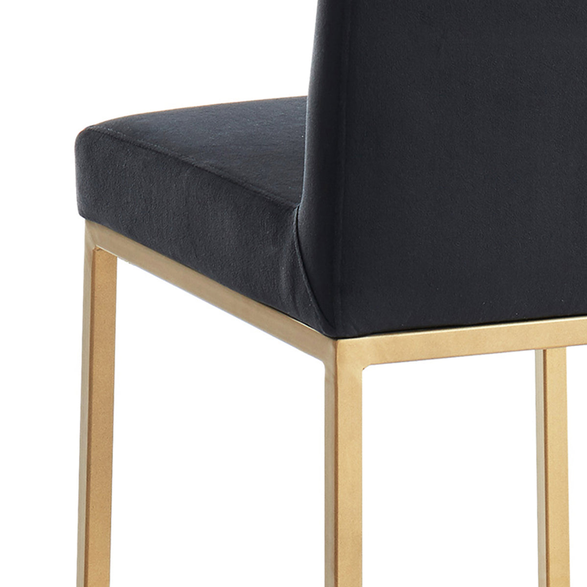 Close-up of Diego 26-inch counter stool showing black velvet seat edge and aged gold metal leg