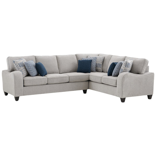 6090 sectional in cream performance chenille, full front view on white background with blue and patterned throw pillows