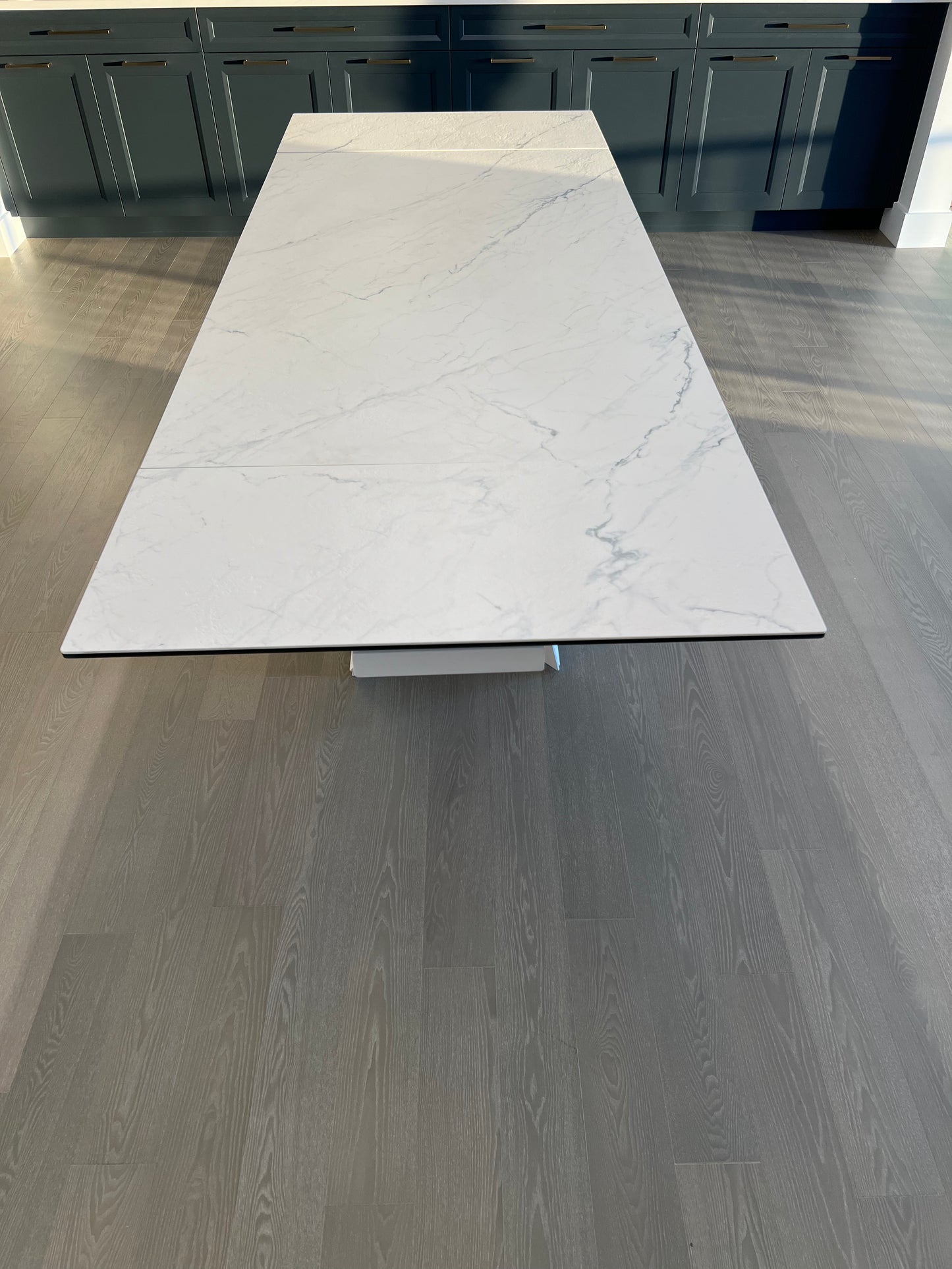 Origami double extension dining table