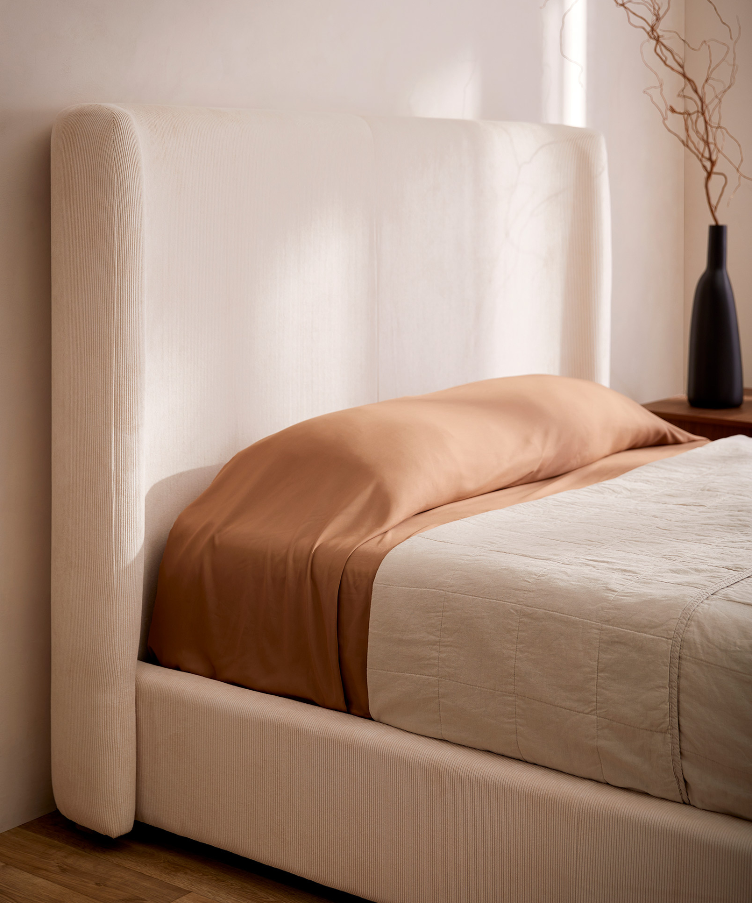 Bed styled in the Luxani showroom