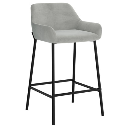 Baily 26 inch counter stool in grey velvet with black metal legs and footrest, three-quarter front view
