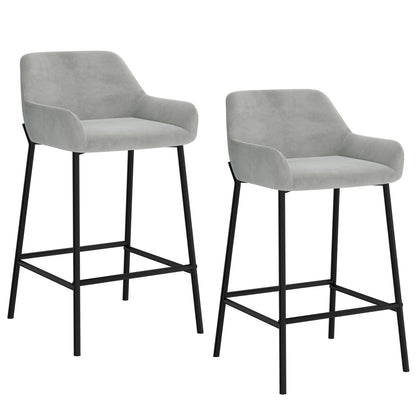 Pair of Baily 26 inch counter stools in grey velvet with black metal legs, front view on white background