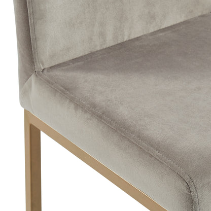 Close-up of the grey velvet upholstered seat corner of the Diego 26-inch counter stool