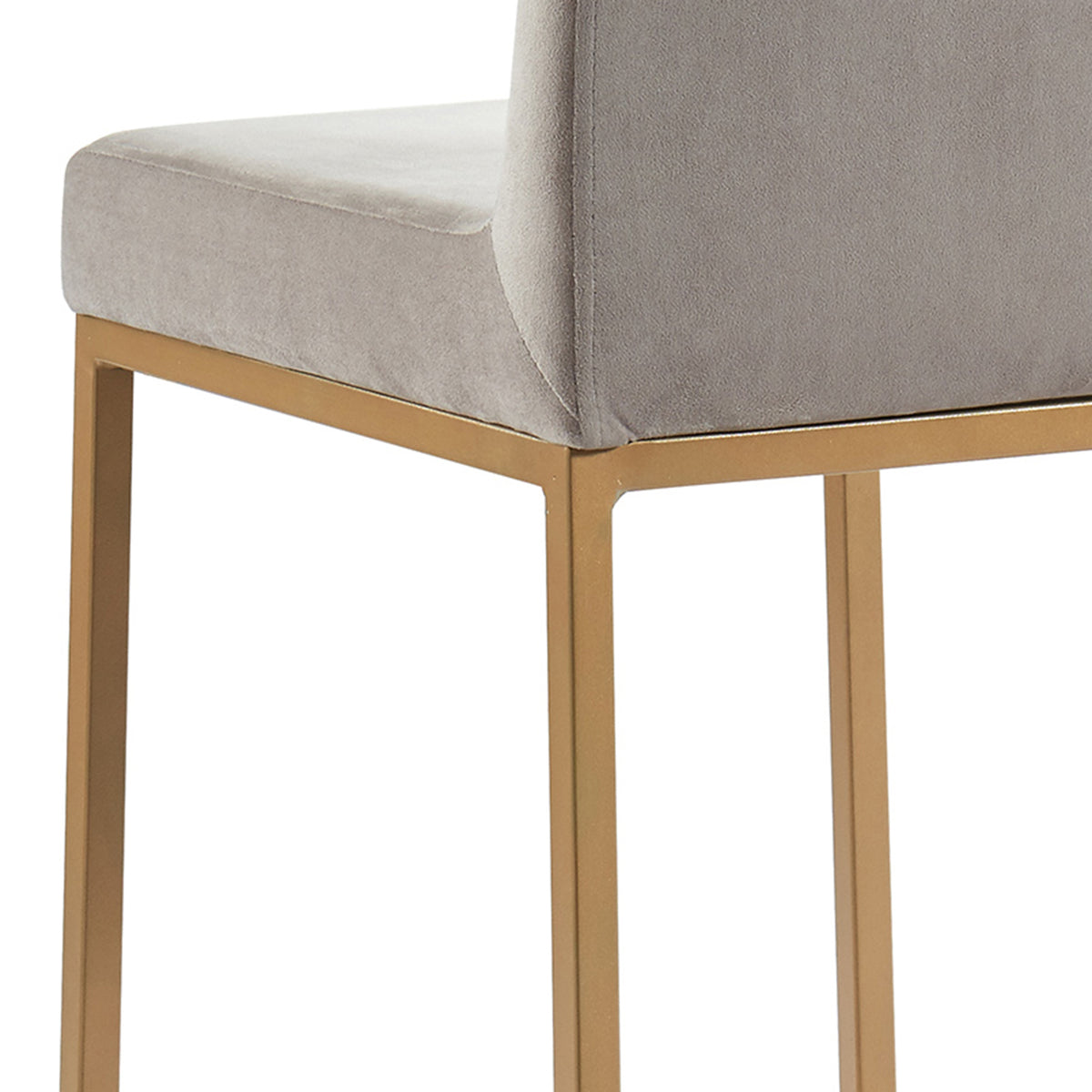 Side detail close-up showing the seat and aged gold leg joinery of the Diego 26-inch counter stool