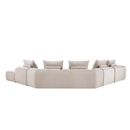 Modani Modular Sectional in beige, rear view of the full sectional showing the upholstered backrests and seat cushions above on a white background